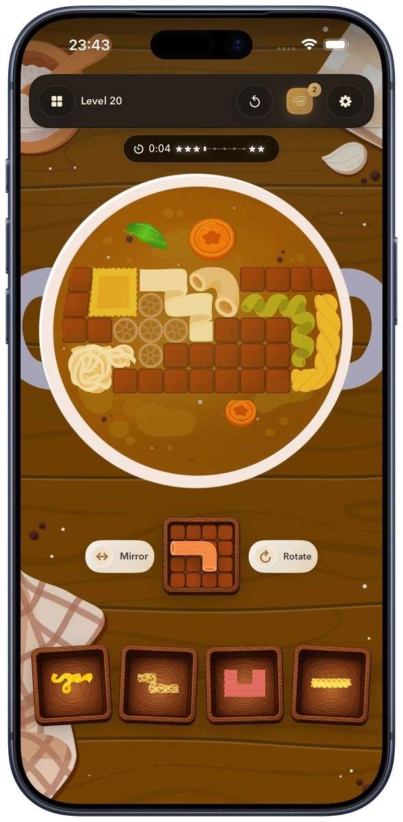 Fresh Start level 20 on iPhone: a fuller puzzle board with differently shaped pasta pieces.