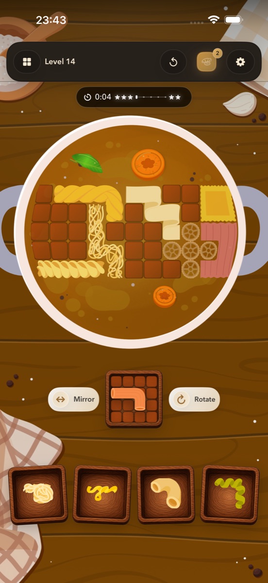 Fresh Start level 14: pasta pieces, a partly filled board and rotate and mirror controls.